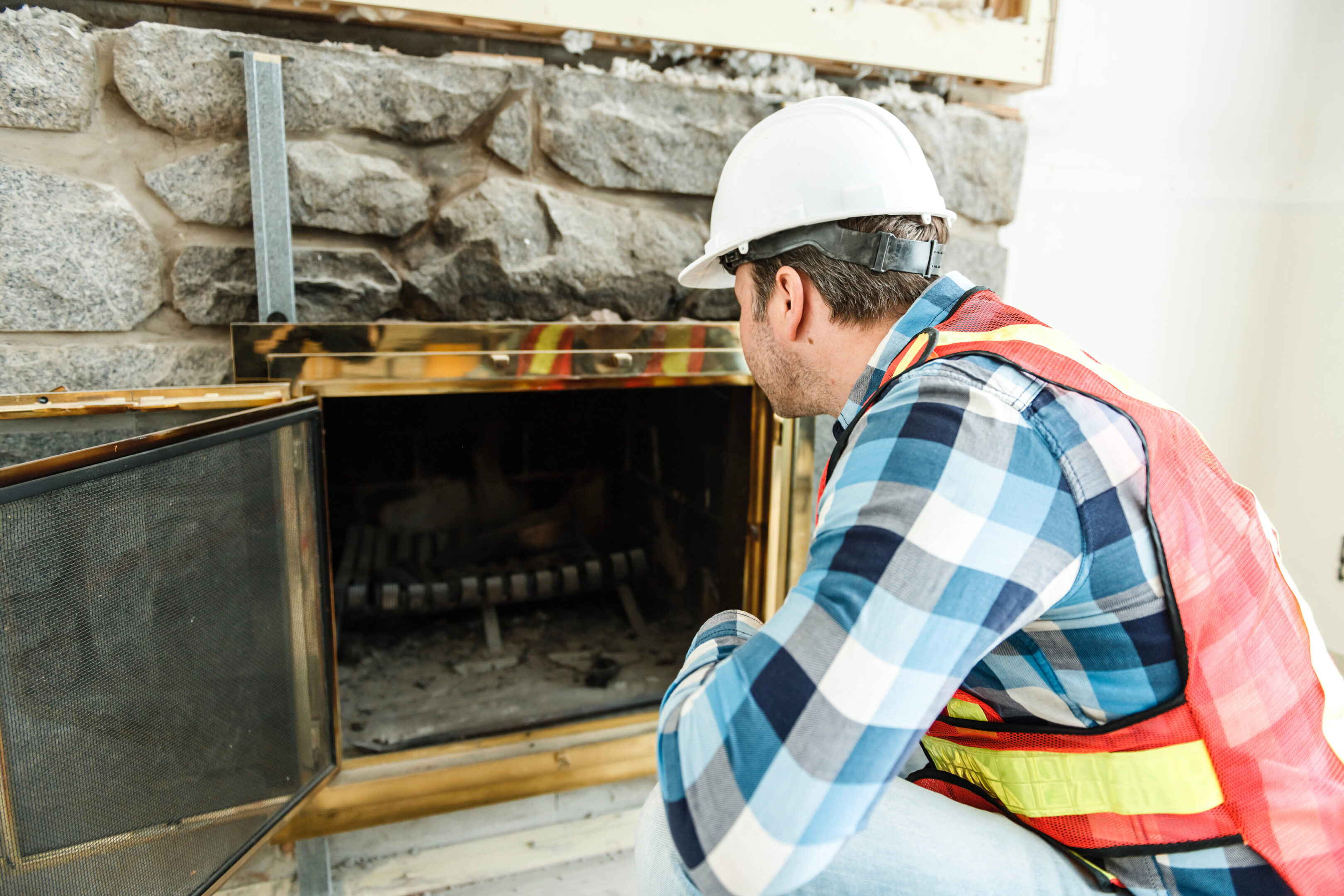 An Inspector inspecting an old house to be sure everything is well build